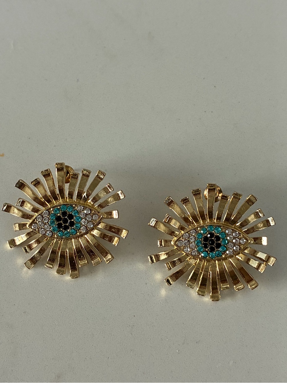 Gold Eye Burst Crystal Statement Earrings in Turquoise and Black